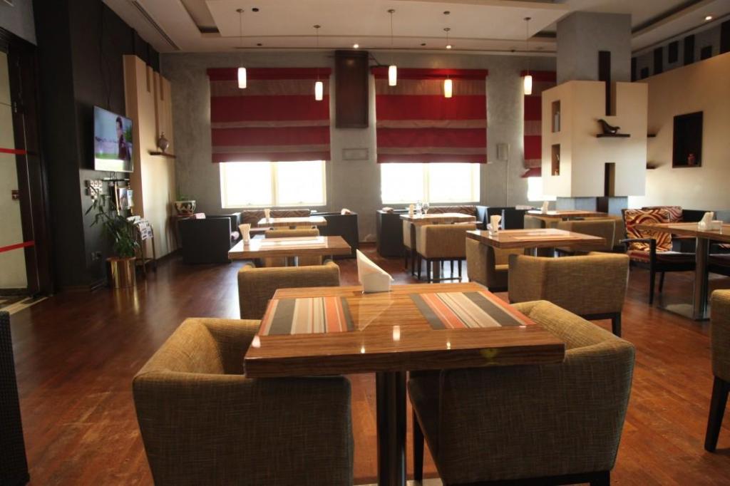 Magnum Hotel & Suites West Bay